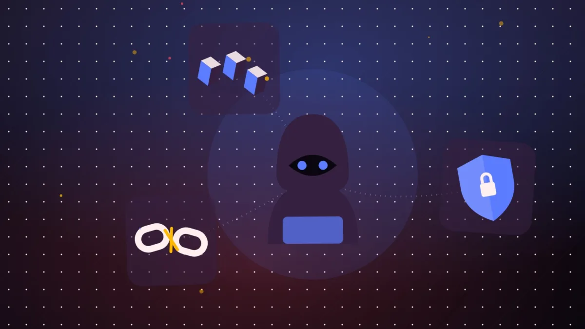 A hooded hacker beside stacked blocks, a shield and a broken chain