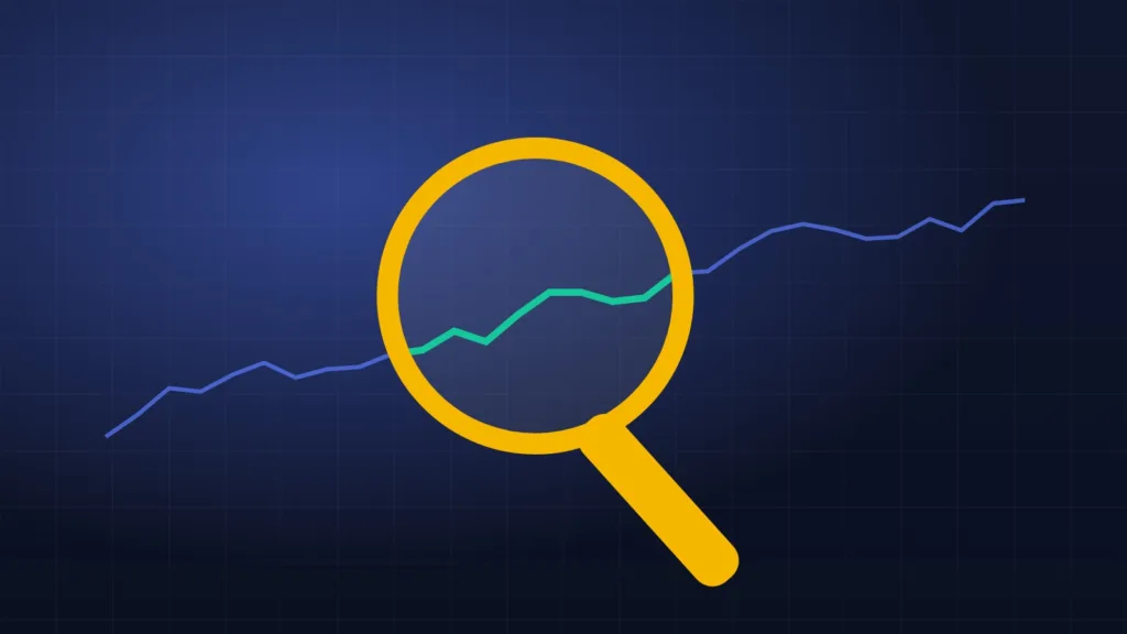 Yellow magnifying glass over a rising blue and green line on dark blue
