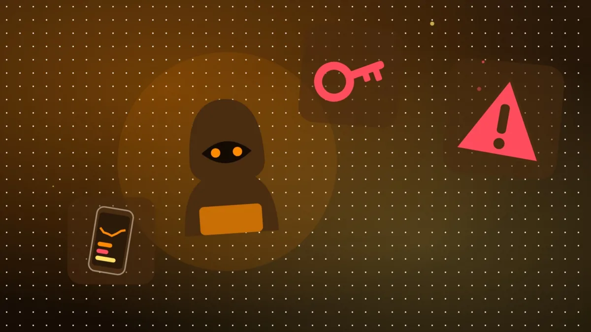 Hooded figure behind a smartphone with a warning sign and a glowing key